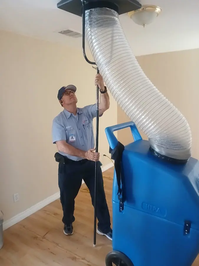 HVAC Installation technician using HEPA equipment in Clarkson